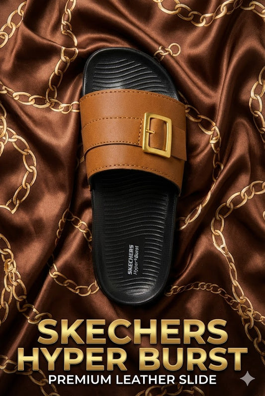 Top-view of a Skechers Hyper Burst slide with a 0% shine matte leather strap and a gold buckle on a luxury silk background.
